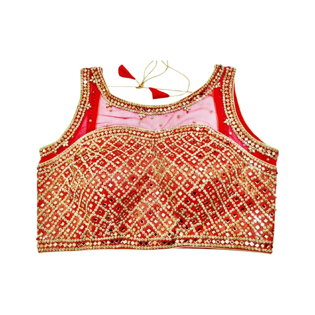 Custom designed red saree blouse with embellishments